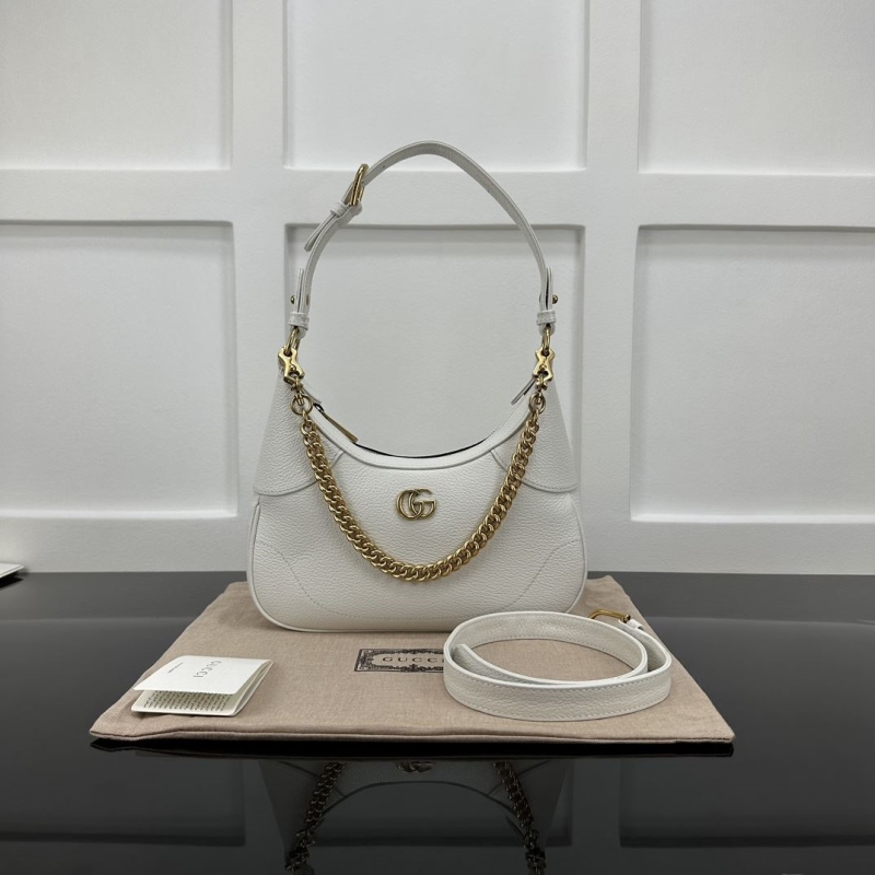 G*u*i top handle bags